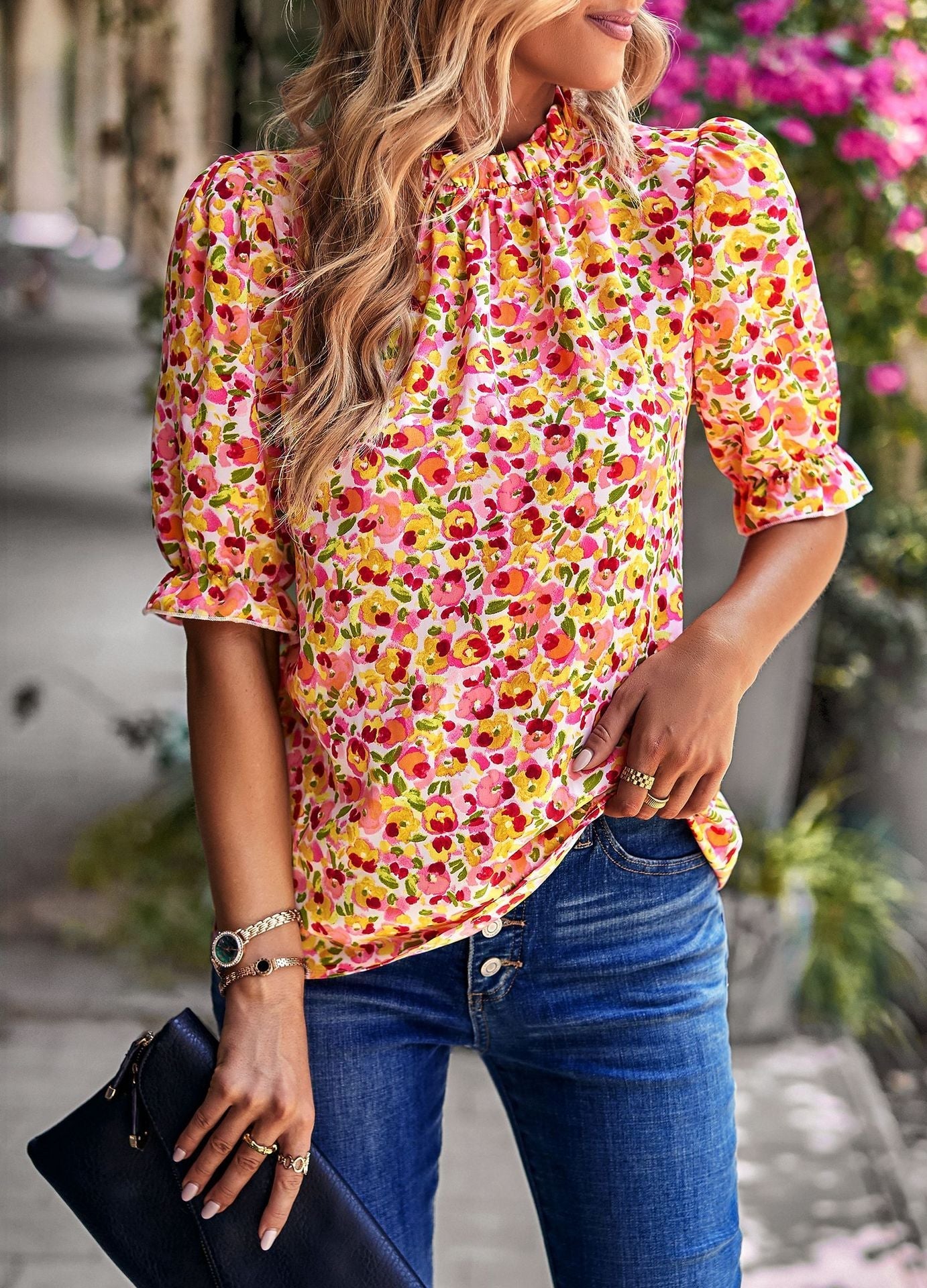 Women's blouse with playful floral design and puff sleeves, size