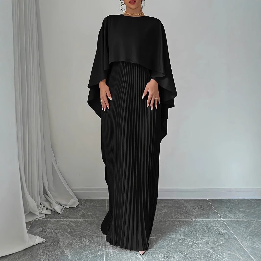 GR | Elegant long dress with batwing sleeves, pleated asymmetrical design, and flowing fit