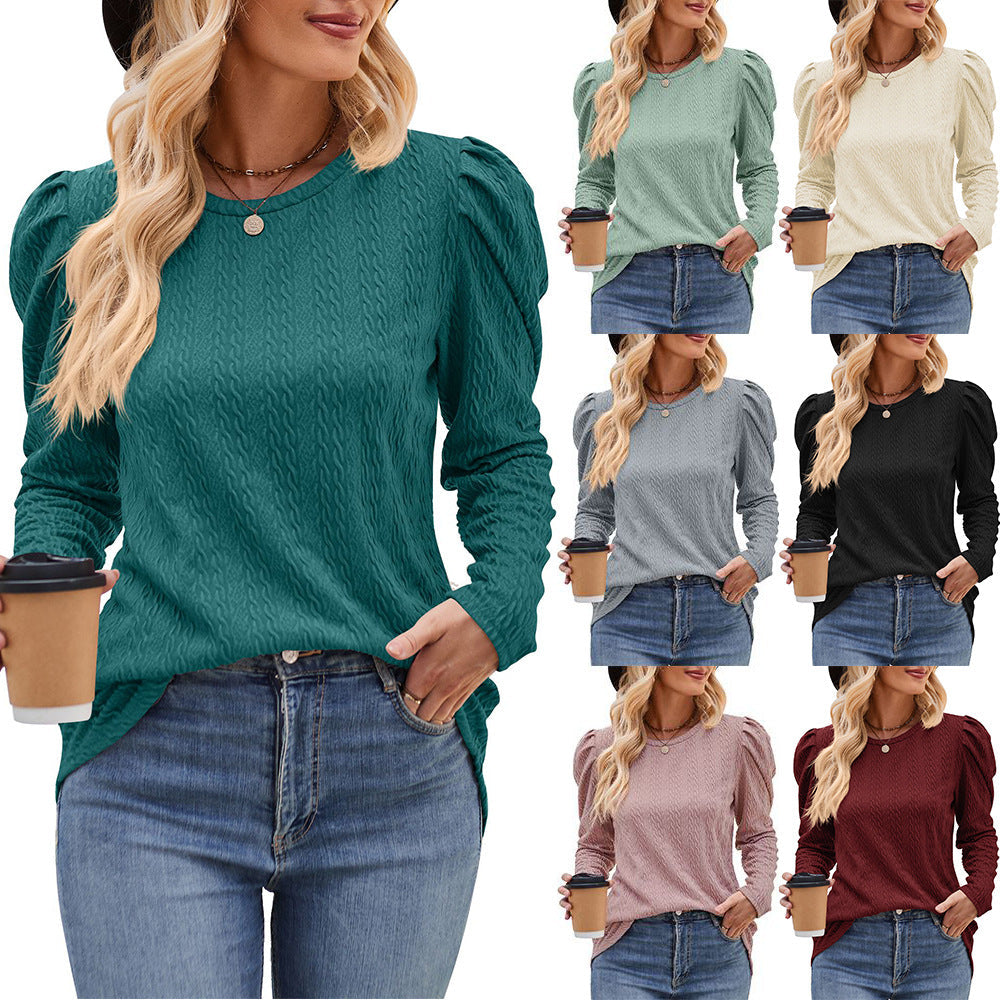 Women's elegant long-sleeved shirt with a textured pattern and puff sleeves, size