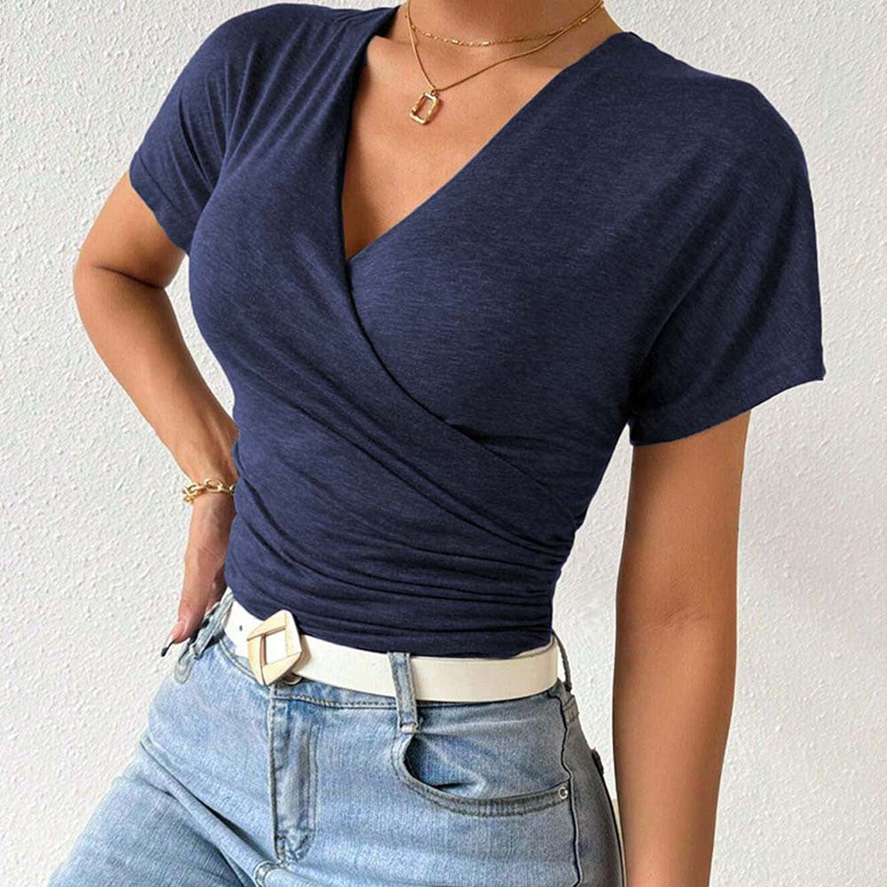 Women's wrap top with sophisticated ruching details, size S