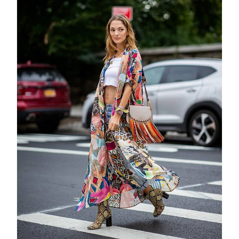 Women's kimono with colorful patchwork design and flowing fabric, size S