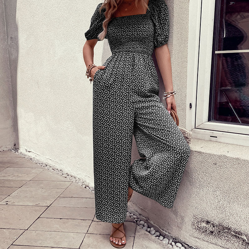 Women's oversized jumpsuit with puff sleeves and elasticated waistband, size
