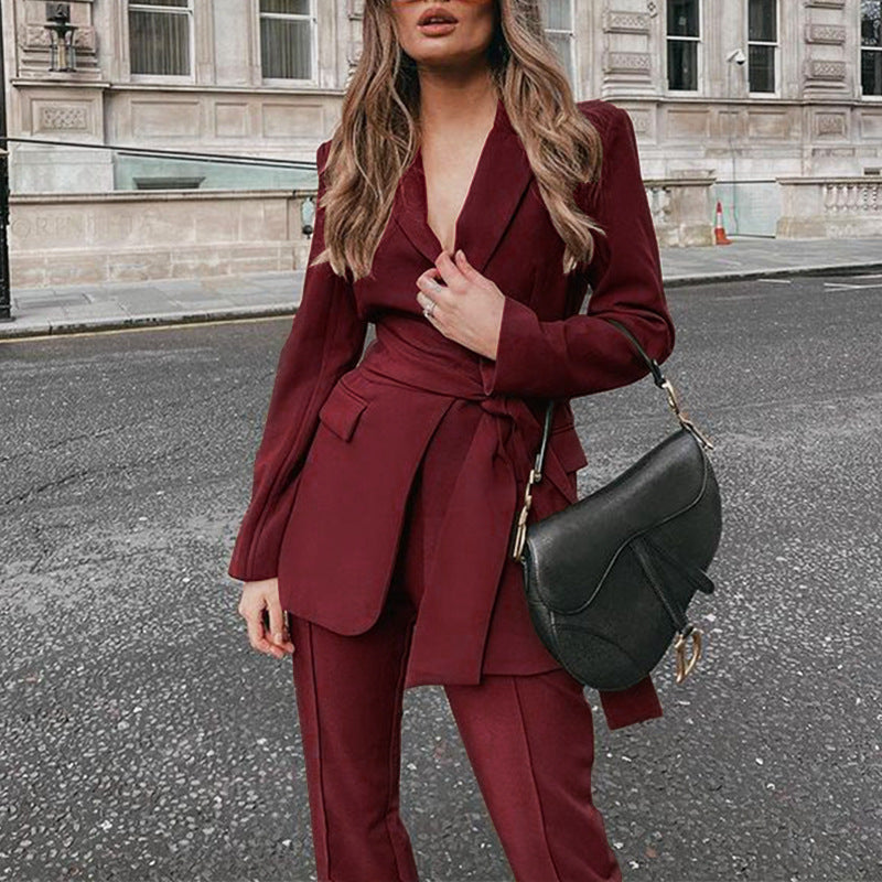 Women's blazer suit with tailored cut and elegant belt, size