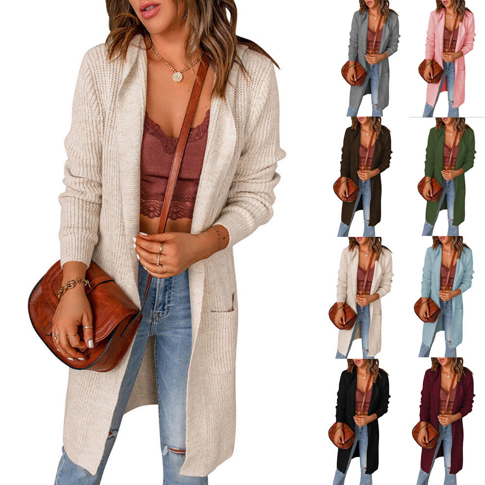 Women's knitted coat with deep V-neck and generous pockets, size