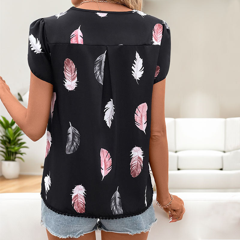 Damen Bluse mit romantischen Federmuster und Puffärmeln GR