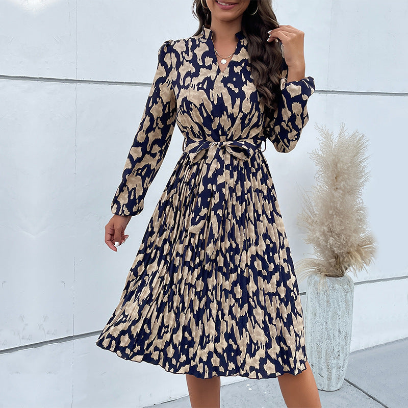 Women's midi dress with a tailored cut and fashionable tie belt, size S