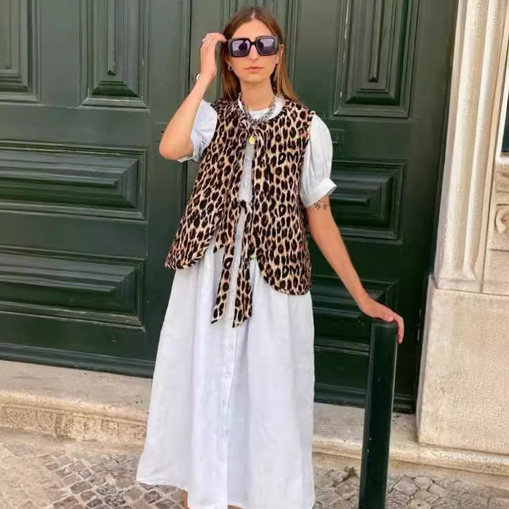 Women's vest in trendy leopard print with playful tie belt, size