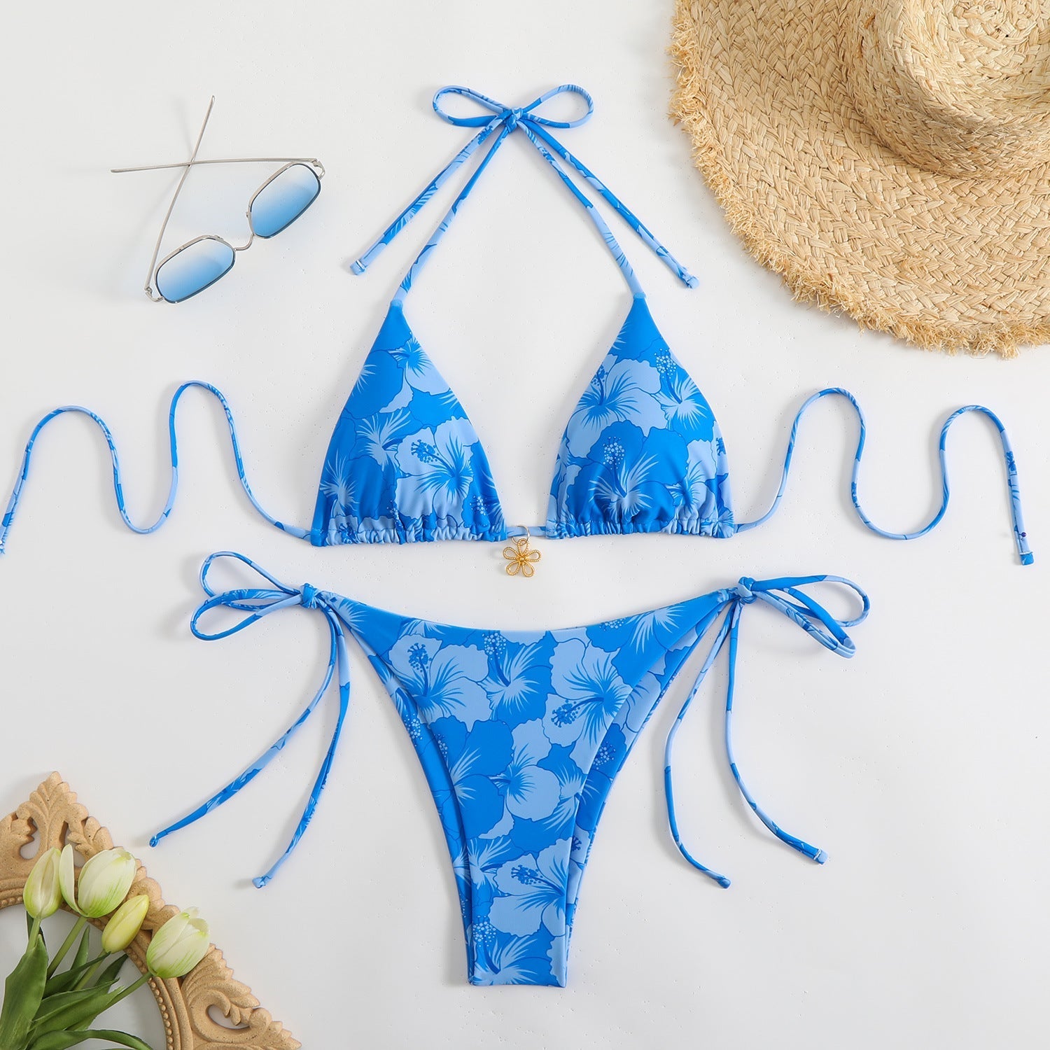 GR | Women's triangle bikini set with playful floral pattern and tie straps