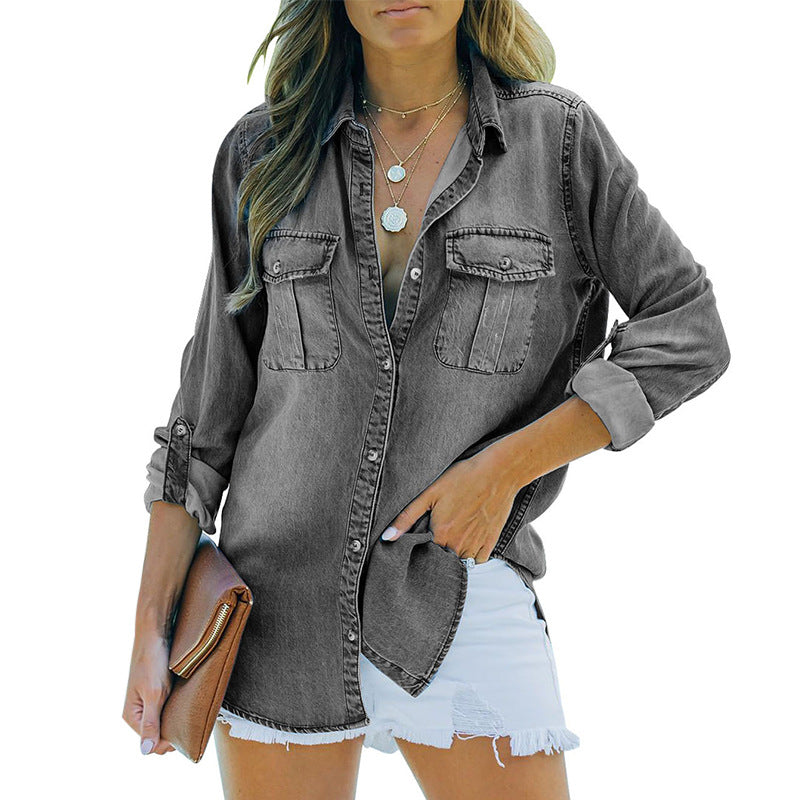 Women's denim shirt blouse with practical chest pockets and classic cut, size S