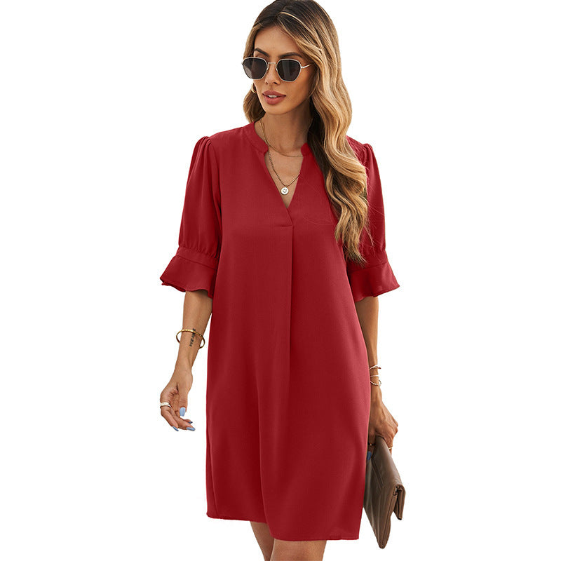 Women's elegant mini dress with a flattering V-neck and puff sleeves, size S