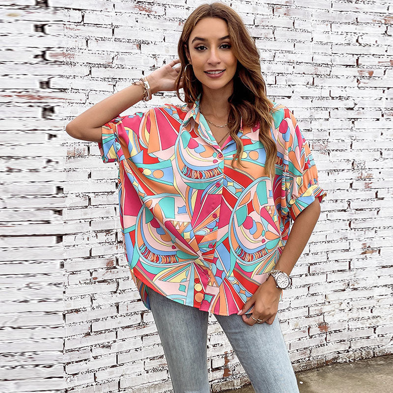 Damen farbenfrohe Bluse mit geometrischem Muster und modischer Knopfleiste GR