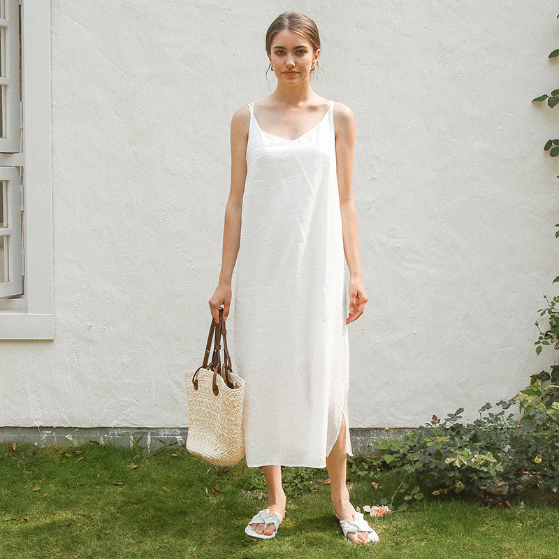 Women's elegant linen dress with adjustable spaghetti straps and flowing cut, size S