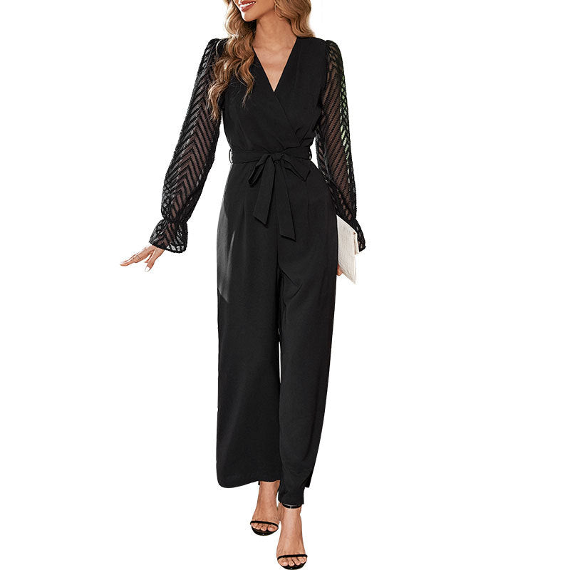 Women's elegant jumpsuit with adjustable waist belt and sheer sleeves, size S