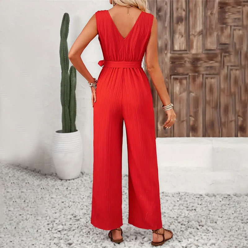 Women's elegant jumpsuit with ruffle details and waist belt, size