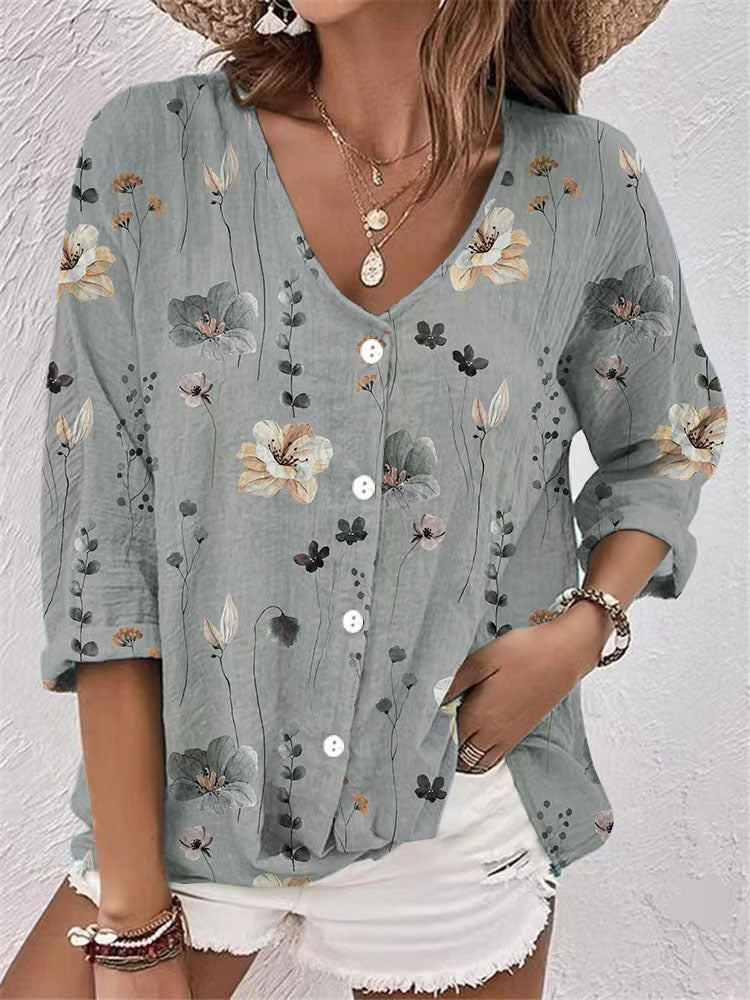 Women's blouse with floral print and modern button design, size