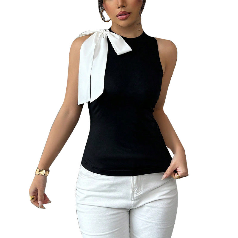 Women's sleeveless top with elegant bow appliqué, size