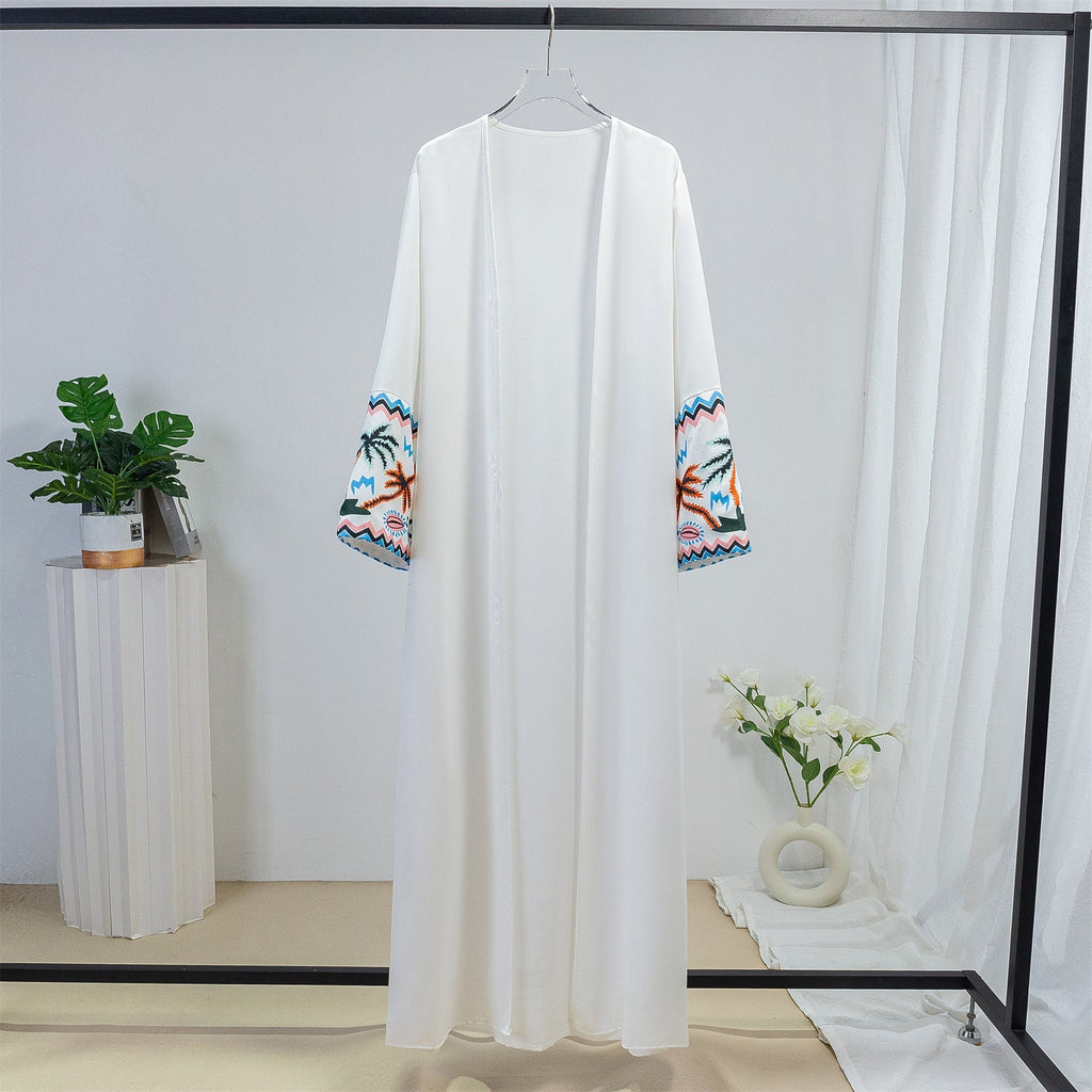 Women's elegant kaftan robe with artistic embroidered details, size