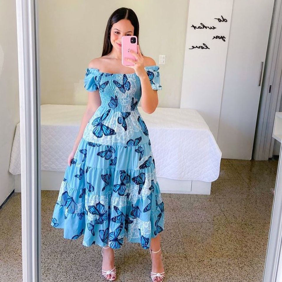 Women's midi dress with off-the-shoulder design and playful butterfly pattern, size S