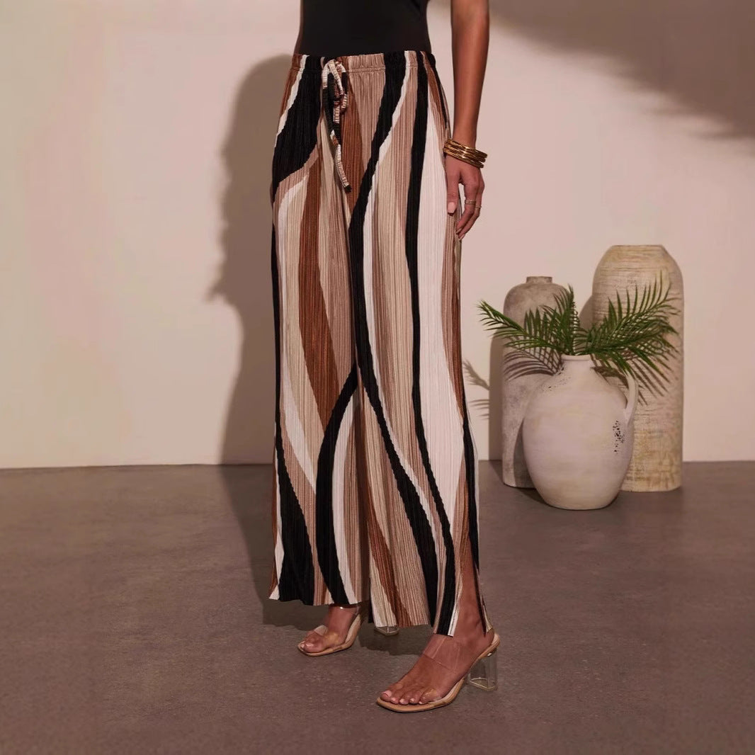 Women's pleated trousers with wide legs and side slits, size