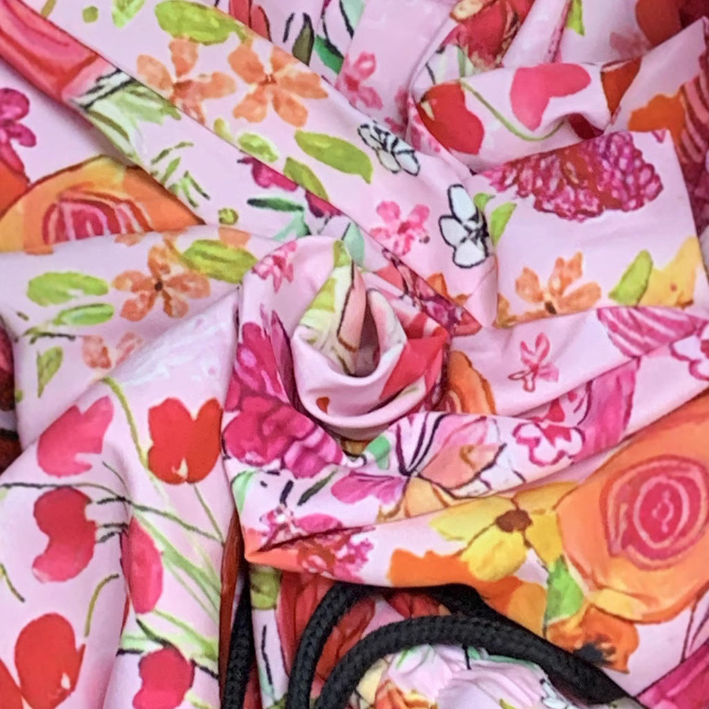 Women's wide-leg floral trousers with elasticated waistband and practical pockets, size