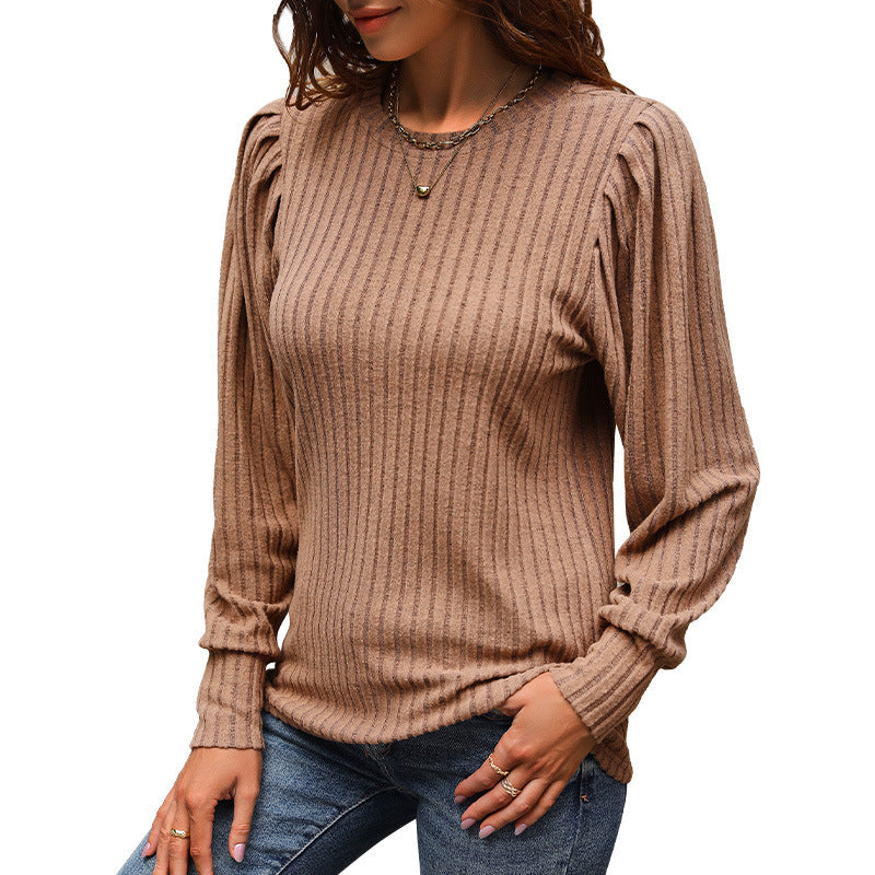 Women's knit sweater with elegant ruffle details and textured fabric, size S