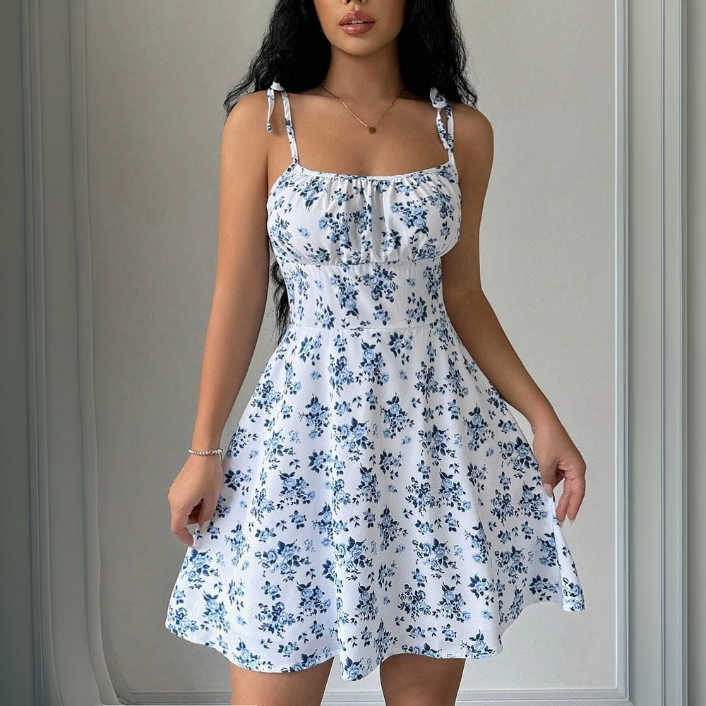 Women's summer dress with adjustable spaghetti straps and floral accents, size [size missing]
