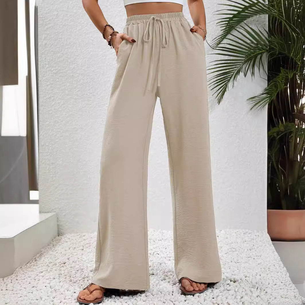 Women's casual, wide-legged leisure trousers with elasticated waistband and side pockets, size S