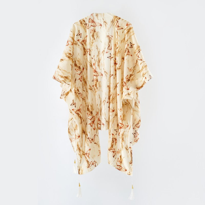 Women's elegant kimono with an artistic floral pattern and fringed edges, size GR
