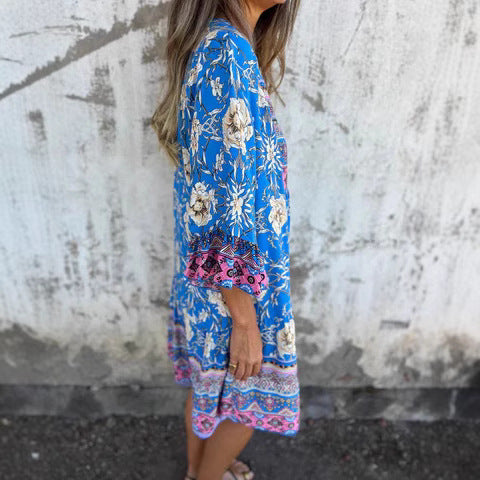 Women's boho-chic dress with floral patterns and button placket, size [size missing]
