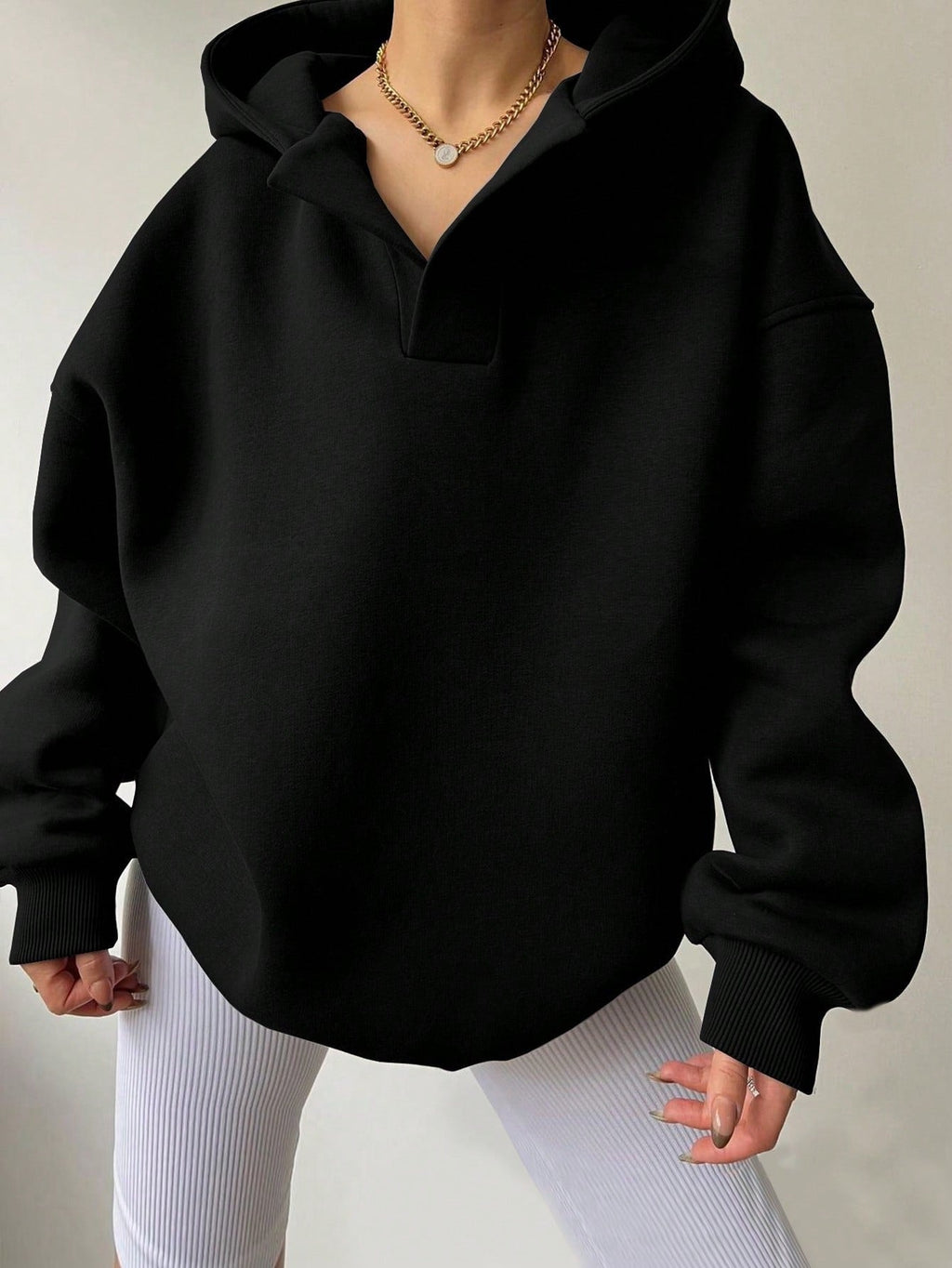 Women's oversized hoodie with a modern collar and relaxed fit, size [size missing]