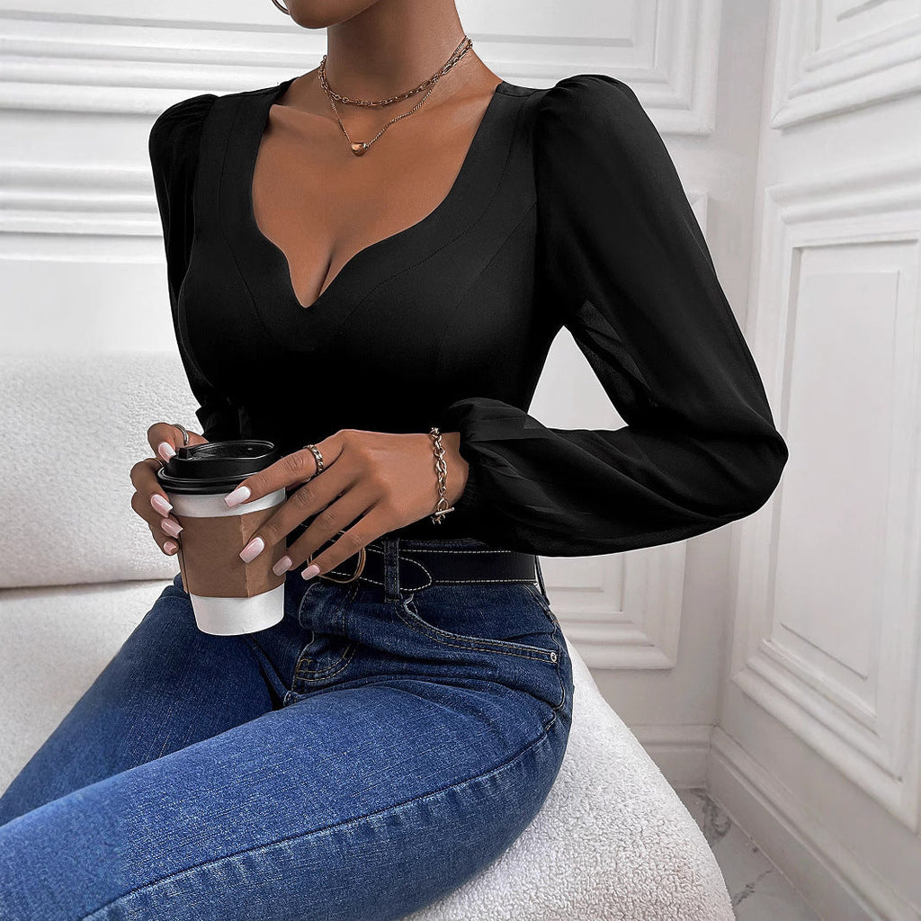 Women's bodysuit with deep V-neck and transparent puff sleeves, size