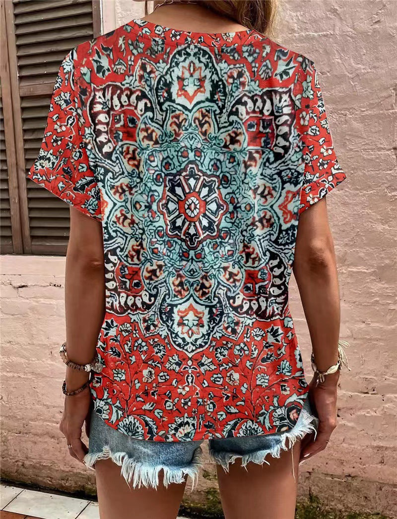 Damen Kurzarm Bluse mit dekorativem Musterdruck und knöpfbarem Ausschnitt GR