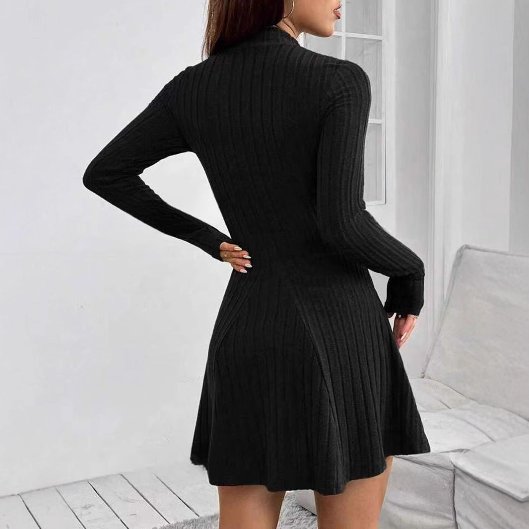 Women's knitted dress with a structured design and long sleeves, size