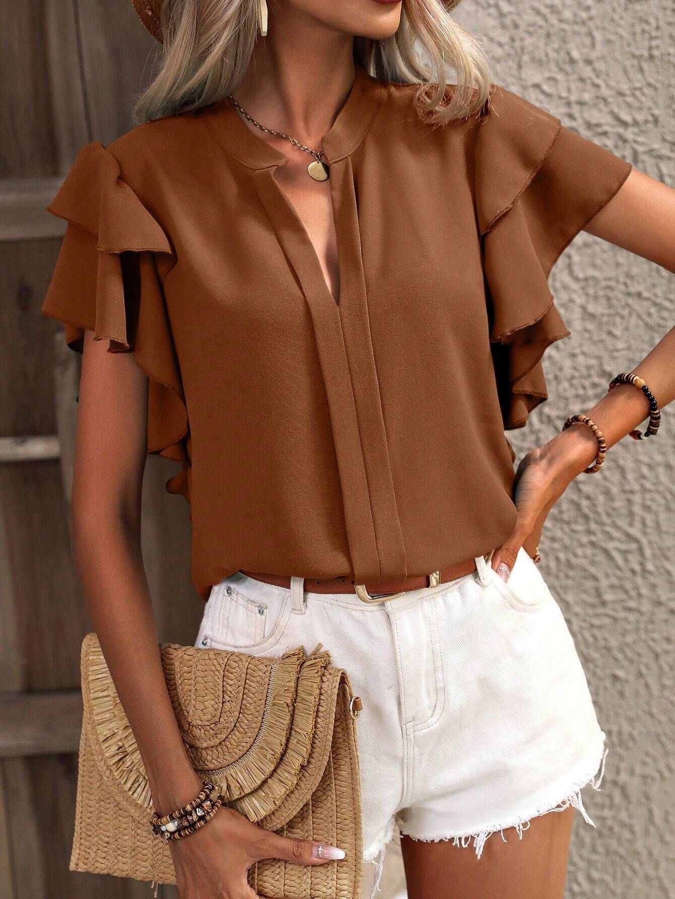 Women's blouse with decorative ruffle details and elegant V-neck, size [size missing]