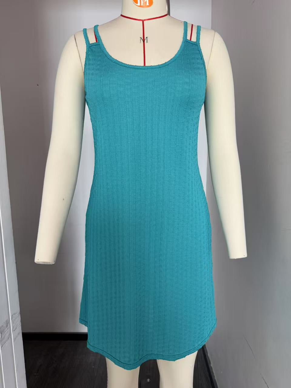 Women's casual dress with elegant strap details, size