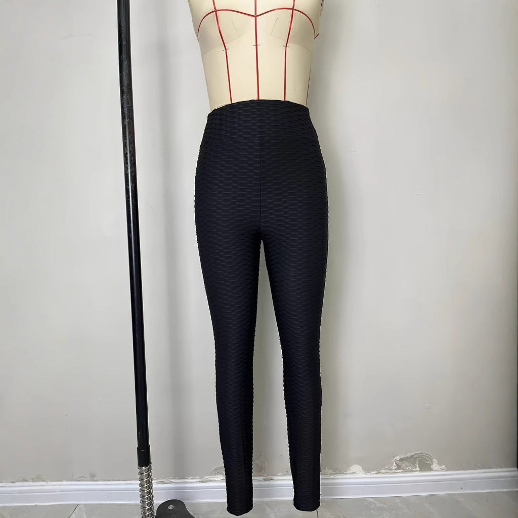 Women's high-waisted sports leggings with a textured surface, size S