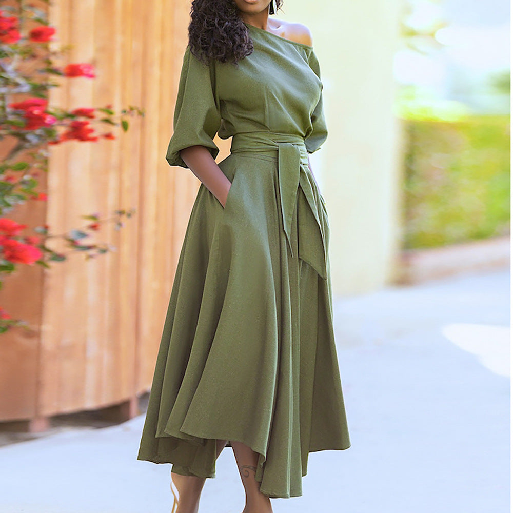 Women's elegant wrap dress with asymmetrical cut and practical pockets, size