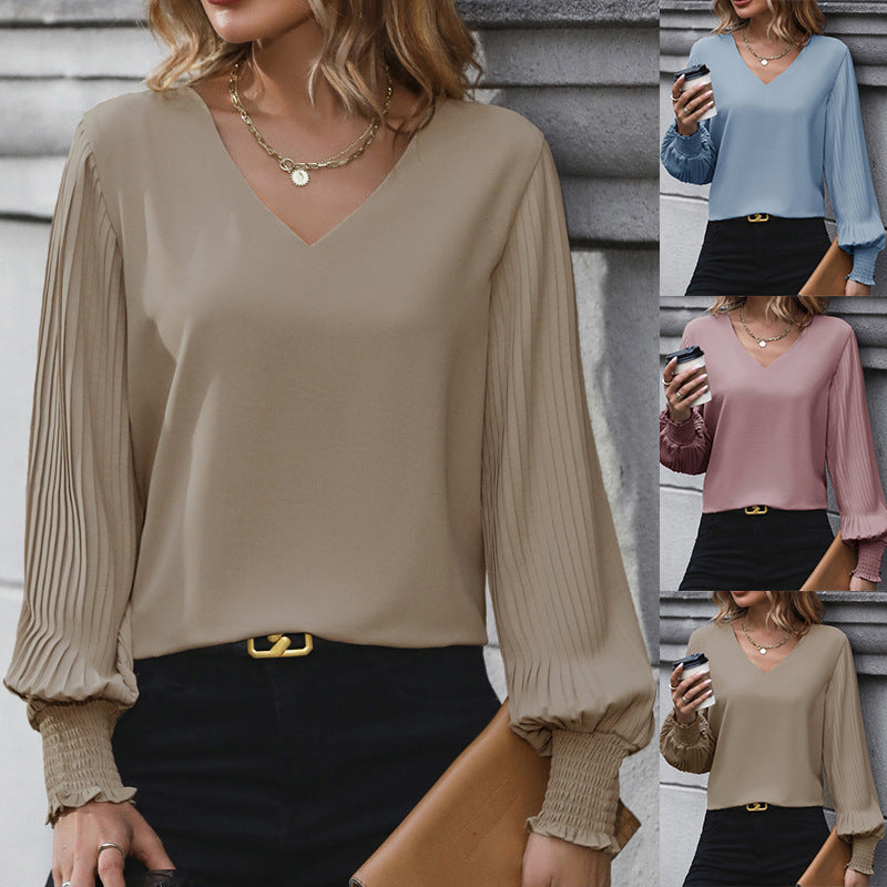 Damen Bluse mit voluminösen Plisseeärmeln und elegantem V-Ausschnitt GR