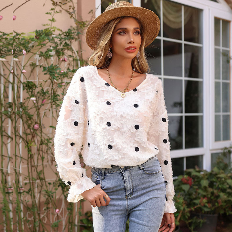 Women's blouse with decorative ruffle details and feminine lace texture, size