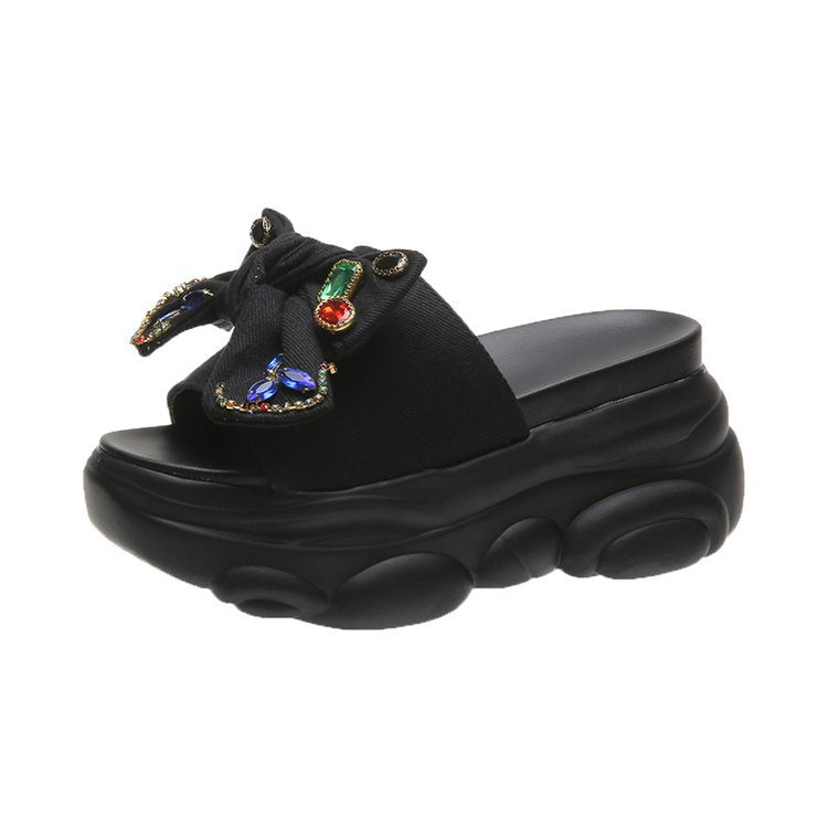 Women's platform mules with decorative bow and rhinestone design, size GR