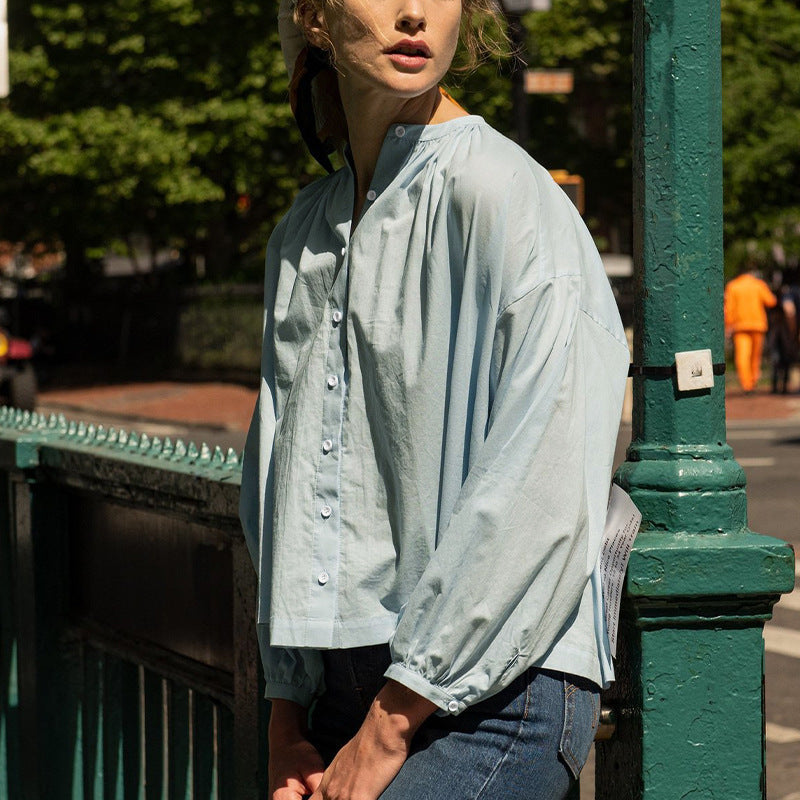 Women's blouse with high collar and elegant button placket, size