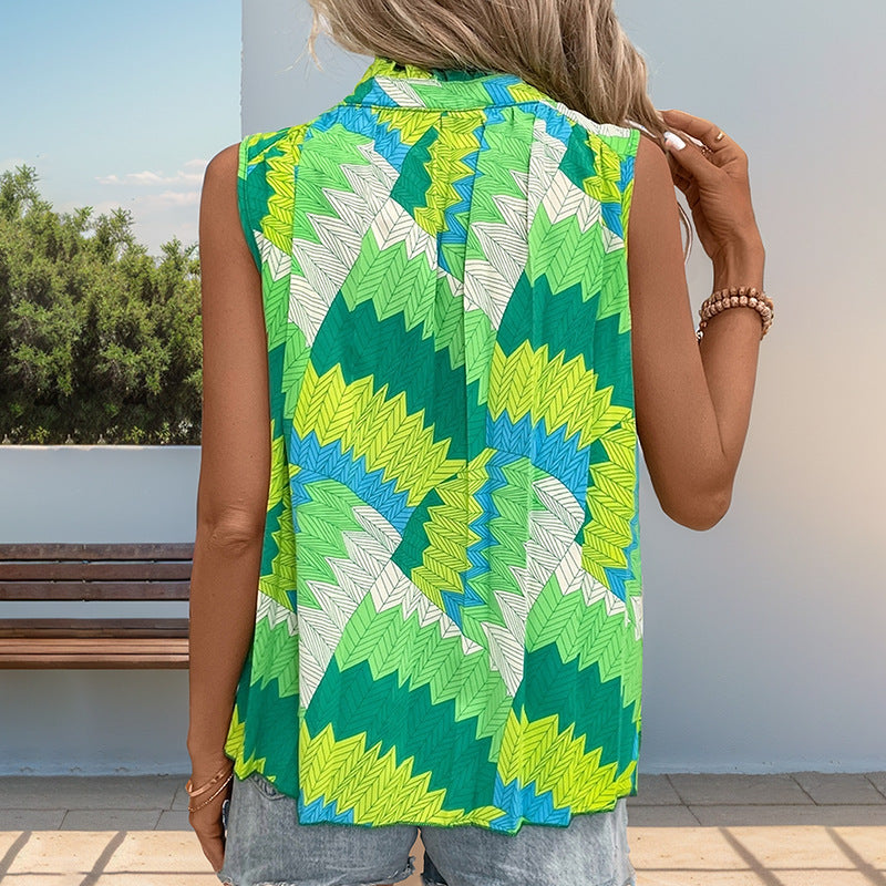 Women's sleeveless blouse with a modern knot design and vibrant pattern, size S