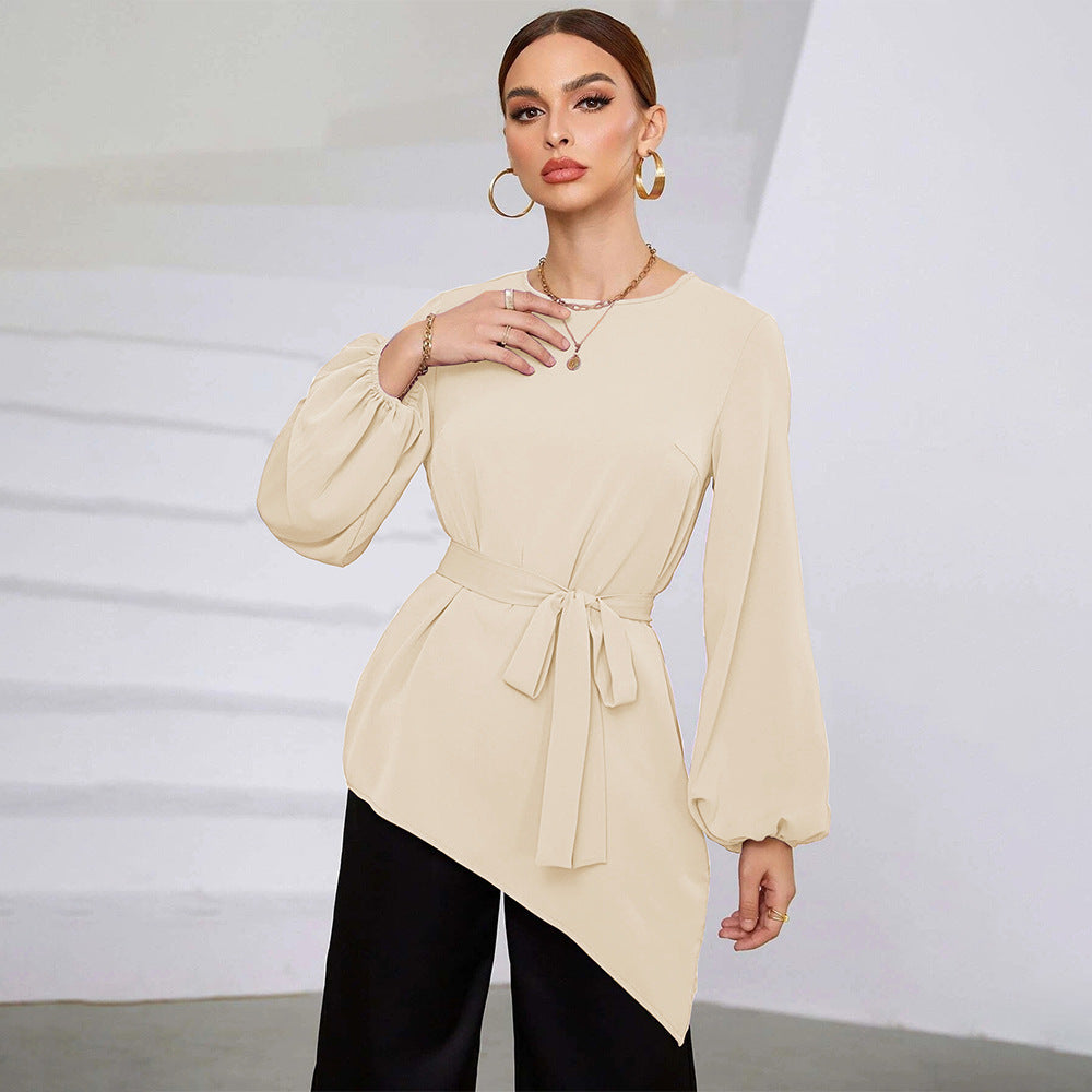 Women's asymmetrical blouse top with elegant ruffles and fashionable waist belt, size S