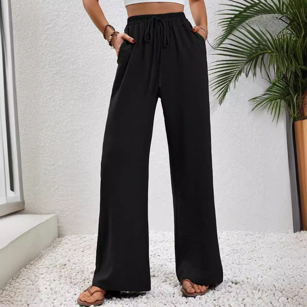 Women's casual, wide-legged leisure trousers with elasticated waistband and side pockets, size S