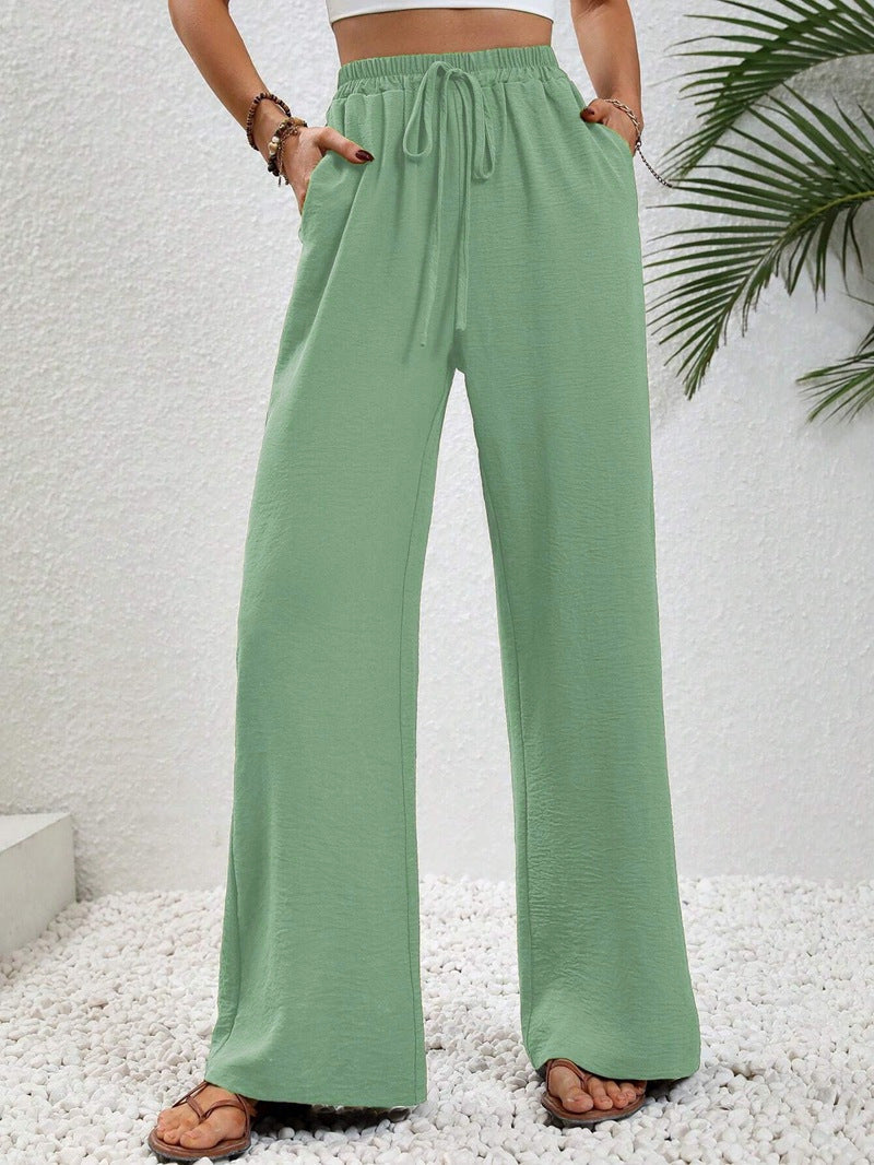 Women's casual, wide-legged leisure trousers with elasticated waistband and side pockets, size S