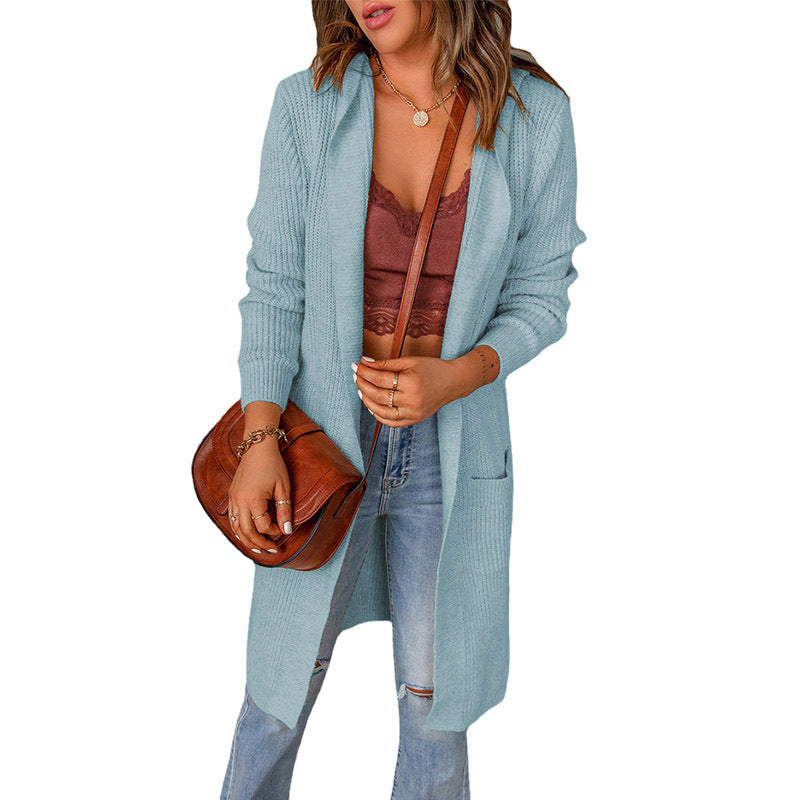 Women's knitted coat with deep V-neck and generous pockets, size