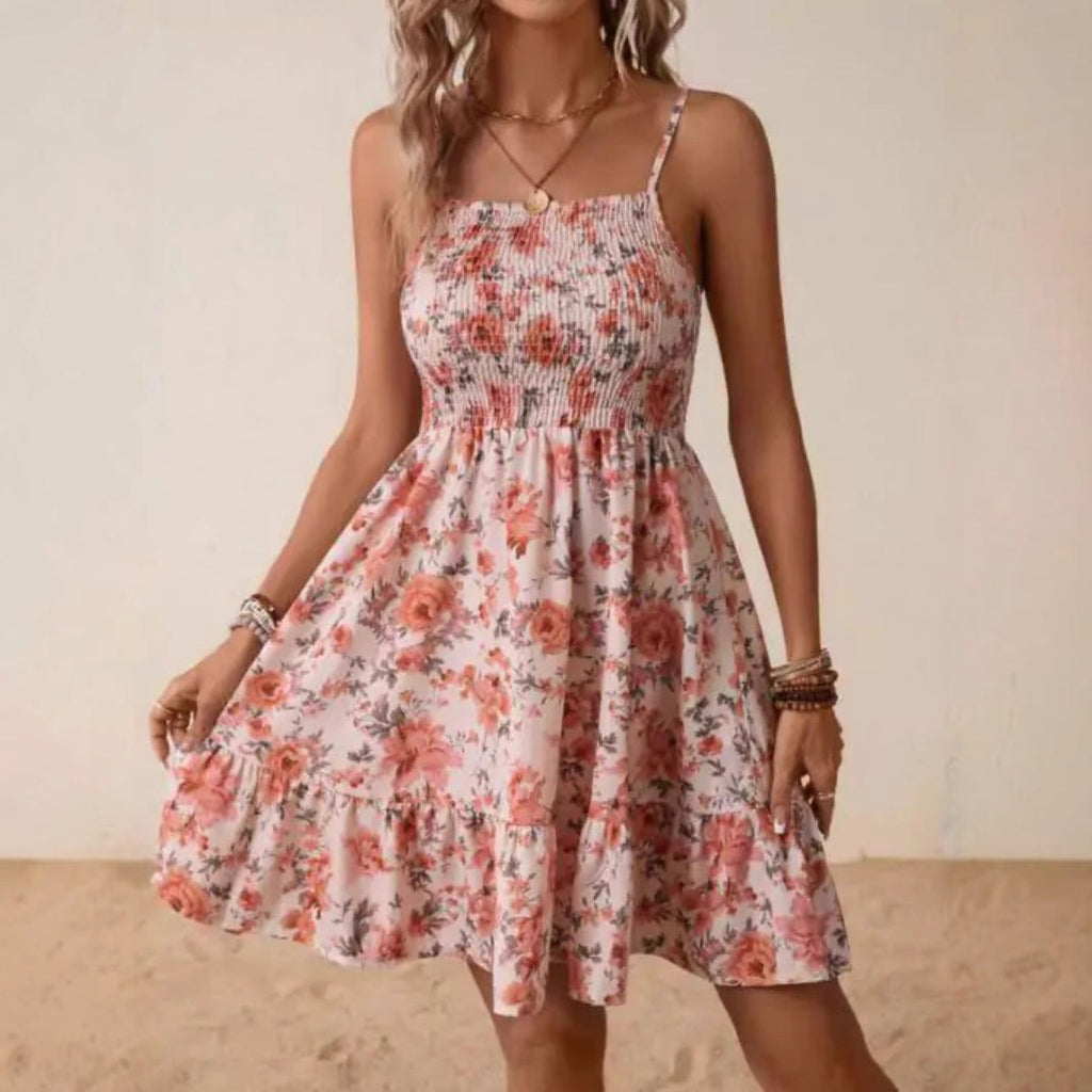 Women's floral dress with elasticated top and gathered skirt, size