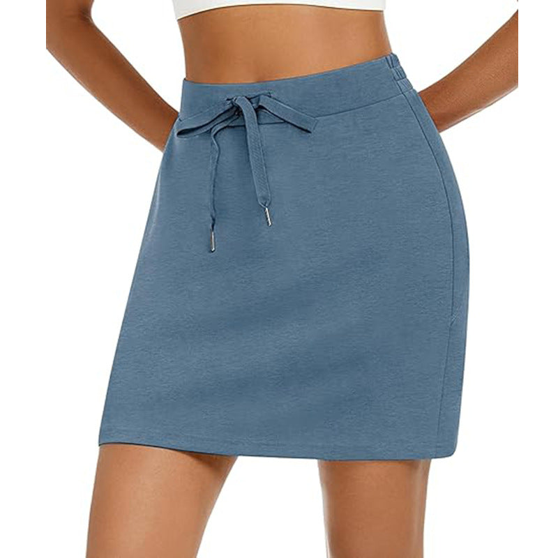 Women's sporty mini skirt with adjustable drawstring and side pockets, size