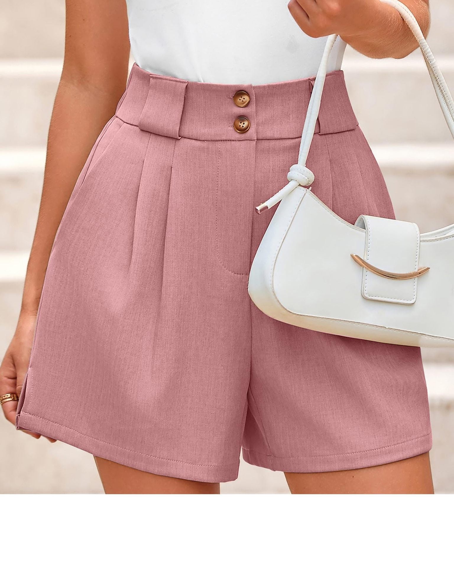 Women's elegant high-waisted shorts with button details and a wide cut
