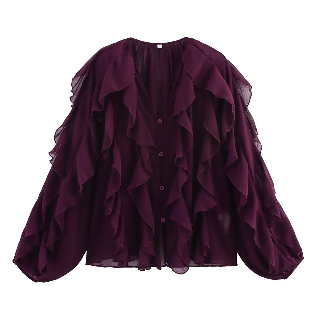 Women's blouse with voluminous ruffle details and elegant cut, size S